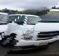 IMAX Private Transfer 7 Guests Cairns Airport to Hotels in Cairns City - Attractions Perth